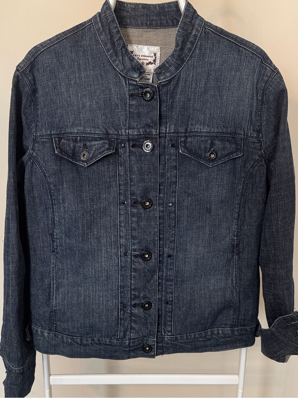 Levi’s Classic Blue Denim Collarless Denim Jacket.